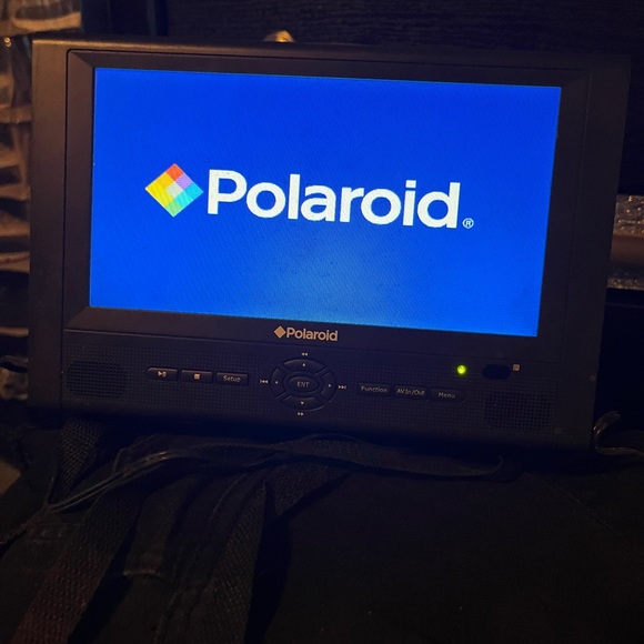 Polaroid two tv screen portable DVD player 15-1 game controller - Picture 2 of 3